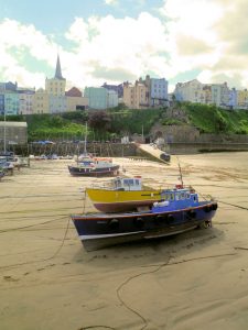 Tenby Harbour with spire of St John's Church in the background