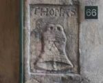 A carving of a bell with the letter A at the Beauchamp Tower, Tower of London, by Thomas Abell