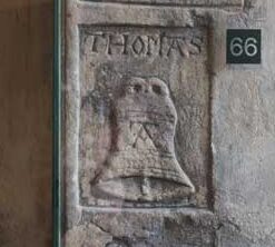 A carving of a bell with the letter A at the Beauchamp Tower, Tower of London, by Thomas Abell